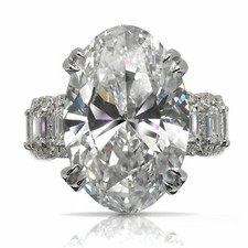 COCO 18 CARAT OVAL CUT E COLOR VS1 CLARITY DIAMOND ENGAGEMENT RING 18K WHITE GOL