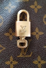 VINTAGE LOUIS VUITTON LOCK AND KEY SET 330