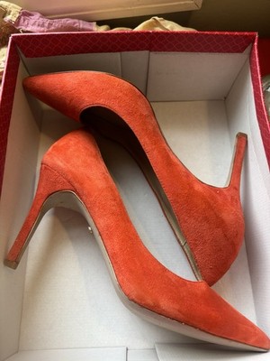 pair of Charles David pointed-toe pumps in a vibrant red/coral suede. Size 8.5