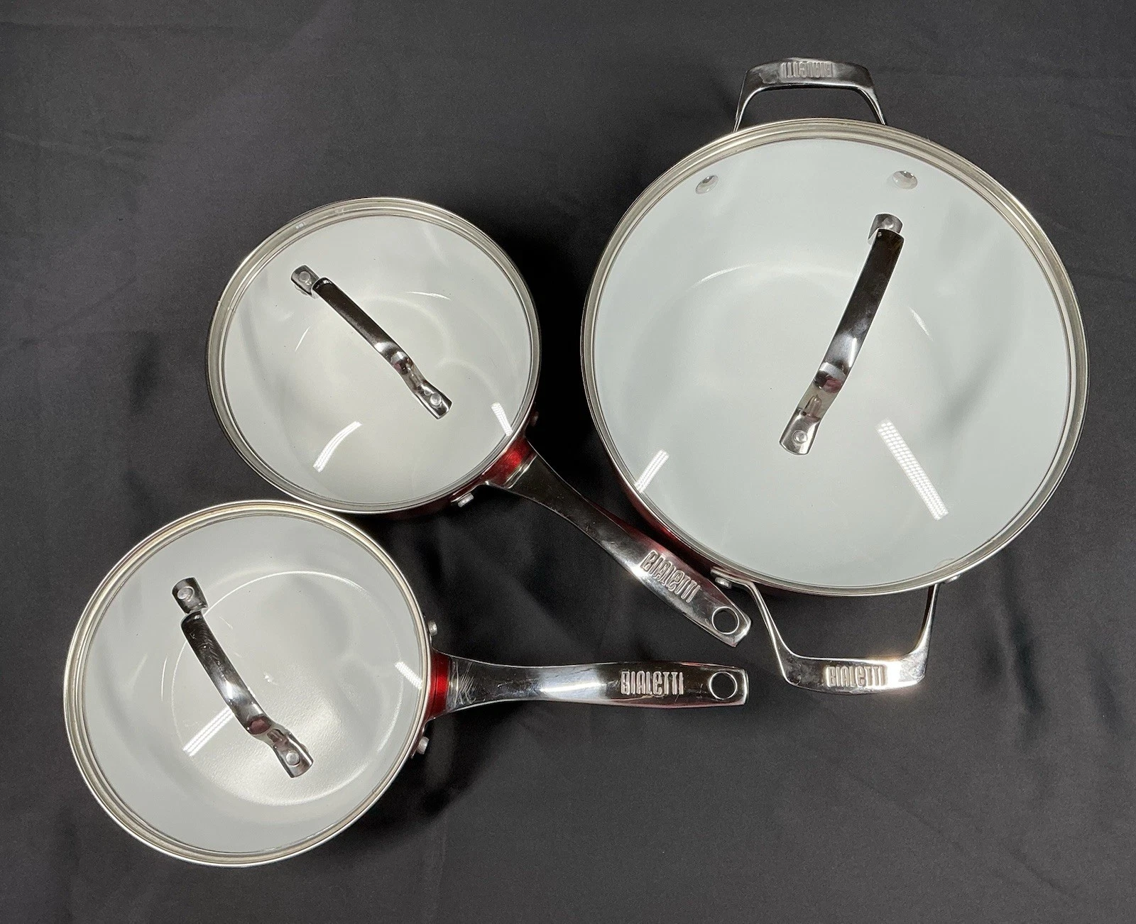Bialetti (lot of 3) Red Induction Pans w/lids 10” Double Handle Two 7” Saucepans