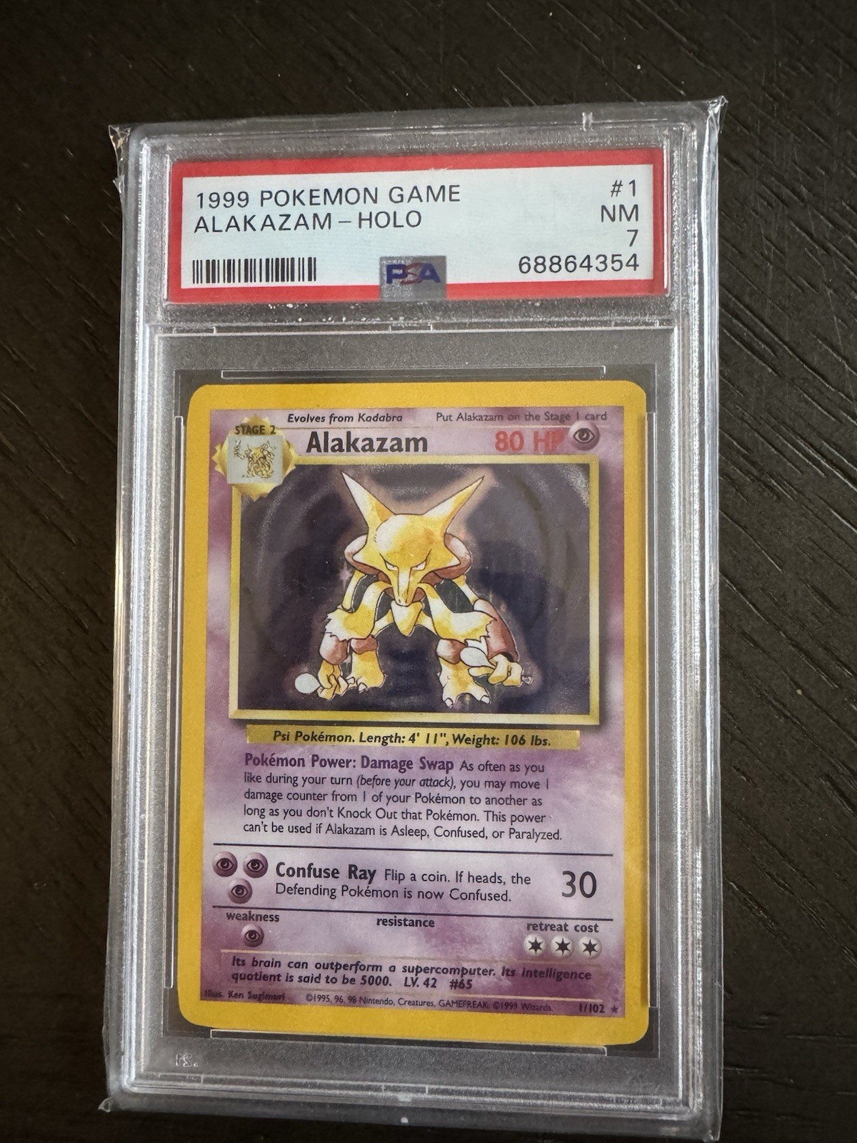 1999 POKEMON BASE SET #1 ALAKAZAM-HOLO PSA 7 - Pokemon Card PSA Graded