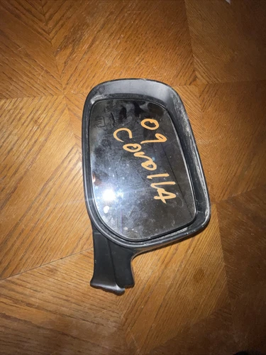 2009 Toyota corolla left side mirror. heated Glass good only. parts