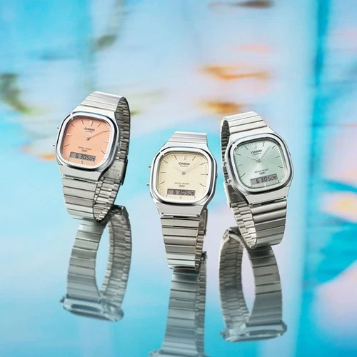 Three silver CASIO CLASSIC Series AQ-240E-4AJF watches with digital displays, rose gold, and mint green straps.