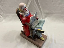 Toscany Collection 9" Ceramic Clown Reading Paper Figurine