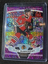 Alex DeBrincat 112 Violet Pixels 211/349 Blackhawks 2019-20 OPC Platinum Hockey