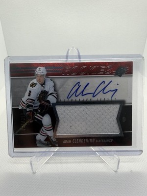 2014-15 Upper Deck SPX Rookies Auto Jersey 139 Adam Clendening /399 Blackhawks