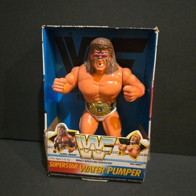 NEW WWF WORLD WRESTLING ULTIMATE WARRIOR SUPERSTAR WATER PUMP TOY USA IN BOX