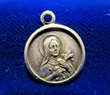 St Therese Lesieux Medal Silvertone Shower of Roses French Inscription