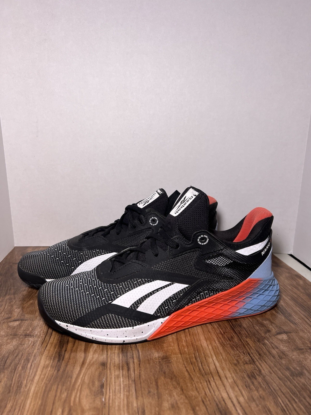 SAOLA Reebok Nano taglia 10 5 nero arancione vivo blu