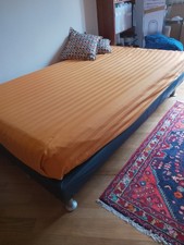 Letto Flou una piazza e mezzo con bordo in pelle blu aviatore