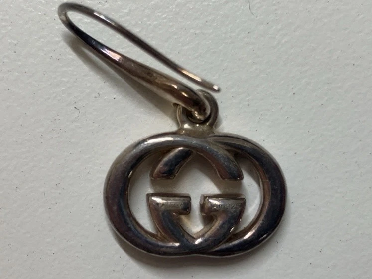 Boucles d'oreilles créoles GUCCI double logo G goutte imbriquée GG accessoires pour femmes