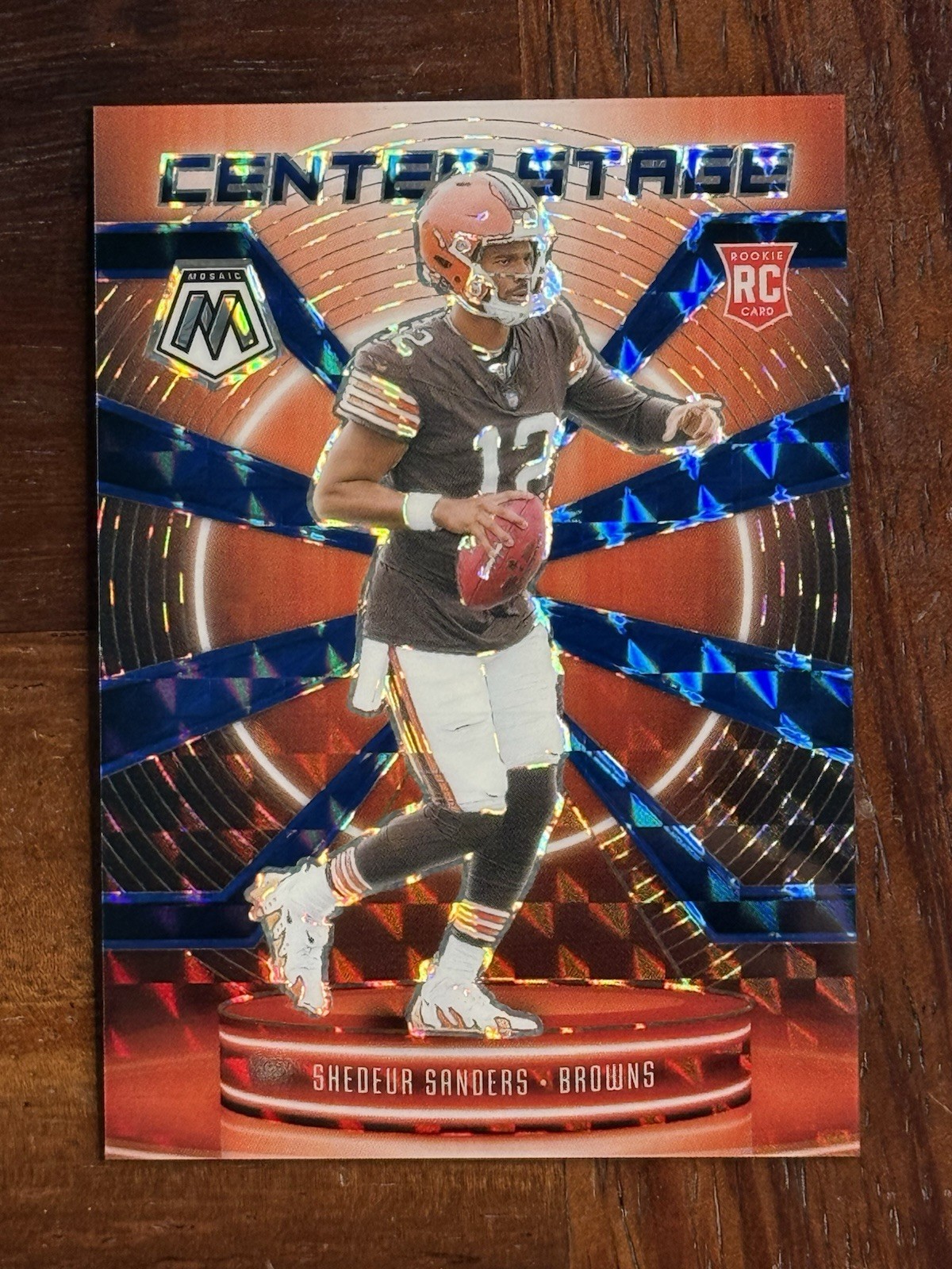 2025 Panini Mosaic - Center Stage RC Shedeur Sanders Blue Mosaic /99 BROWNS