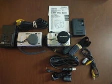 (1) JVC GC-QX3 & (1) Olympus C-740 Digital Camera  w/ Accessories