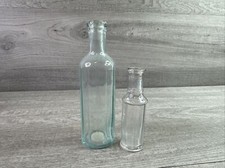 Lot Of 2 Vintage Panel Sided Bottles Aqua & Clear