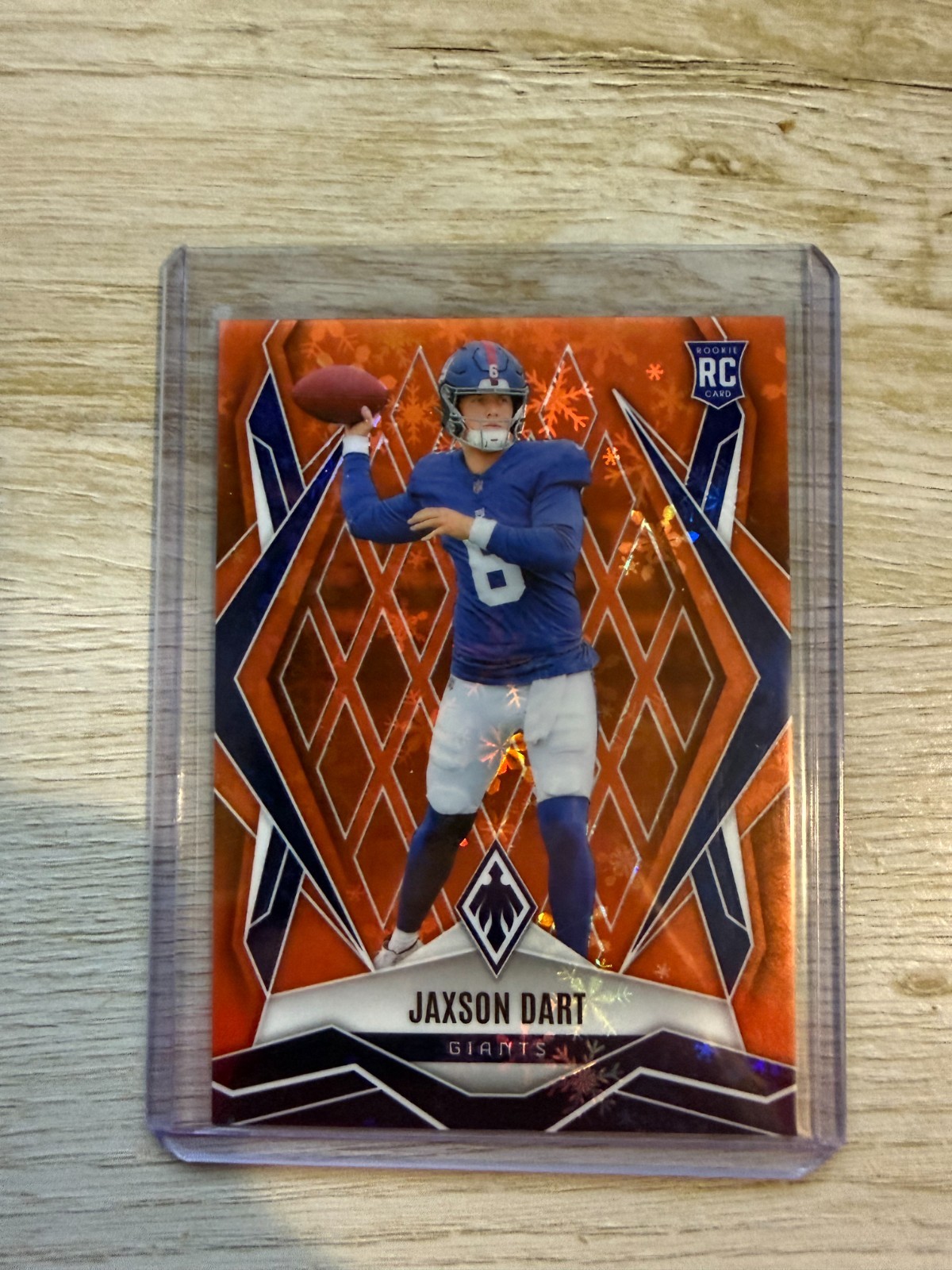 2025 Panini Phoenix Jaxson Dart Orange Winter /99 Rookie #200