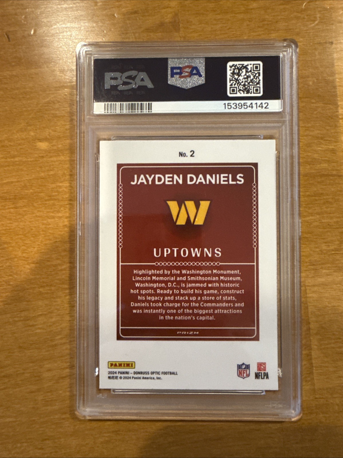 2024 NFL Optic Rookie Jayden Daniels Uptown PSA 9 RC Washington Commanders view 2