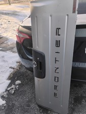 2001-2004 Nissan Frontier Tailgate Tail Gate Silver With Holding Cables Oem