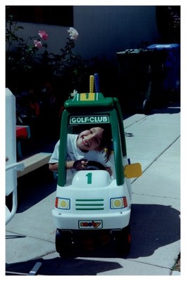 1990s Child Posing in Smoby Golf Club Toy Car Ride-On Vintage Photo