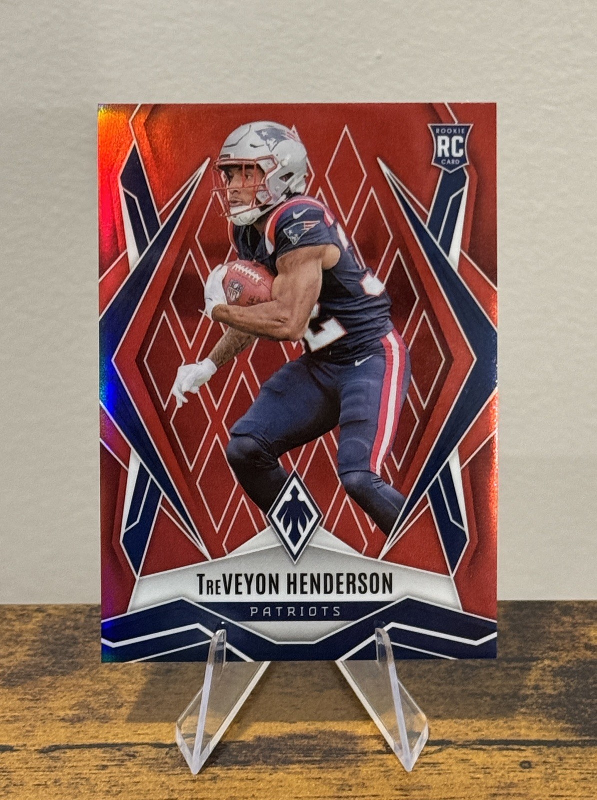 2025 Panini Phoenix TreVeyon Henderson #187 Red /99 RC Patriots 