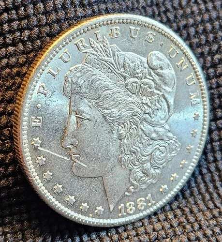 1881 S Morgan Silver Dollar - Fineness .90 - Scratch on obverse - AU+ Condition