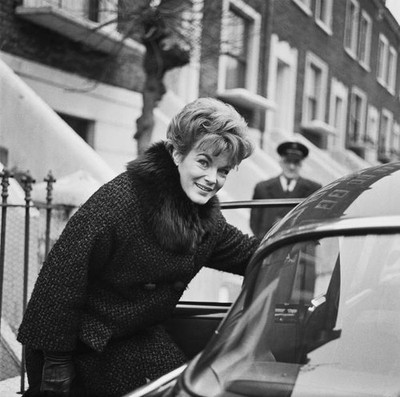British actress Moira Redmond wearing a black coat with a fur coll- Old Photo