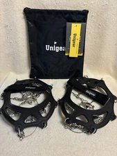 CRAMPONS BY UNIGEAR, SIZE MEDIUM, RUBBER & STAINLESS, BRAND NEW WITH CASE.