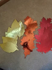 New without package Oversized confetti leaves shiny approx 10inches set of 18