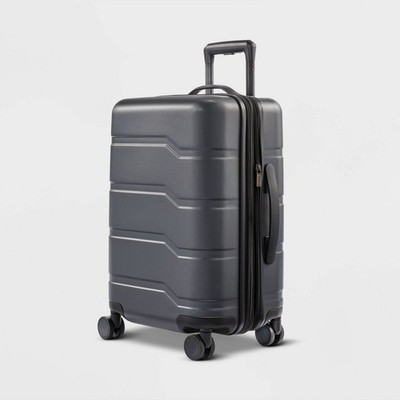 OPEN STORY  HARDSIDE CARRY ON SPINNER SUITCASE - GRAY