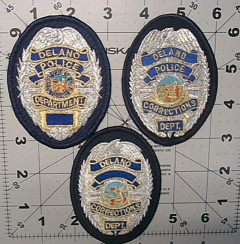 THREE DIFERENT DELANO CA. POLICE PATCHES.