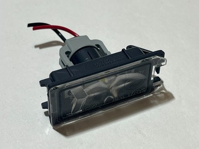 Genuine Mopar License Plate Lamp Right 68228930AA OEM