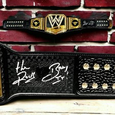 WWE THE ROCK SIGNED WORLD CHAMPIONSHIP BELT INSCRIBED WITH PIC PROOF AND JSA LOA
