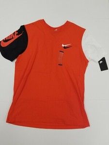 black nike shirt with orange swoosh