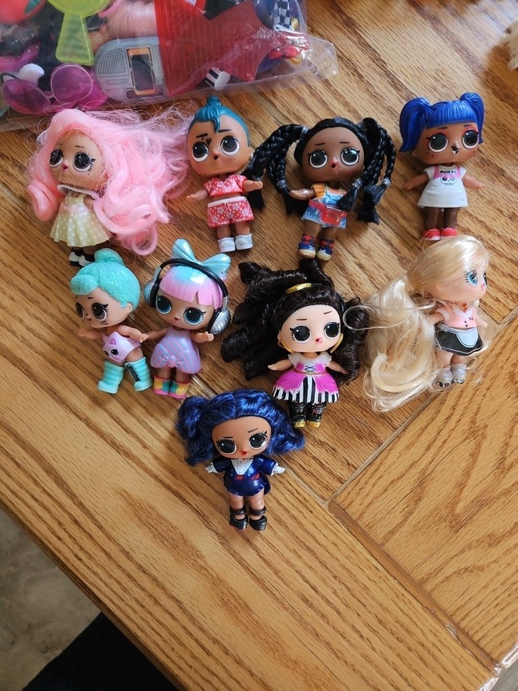Lot Of 9 LOL Dolls With Lots Of Accessories Lots