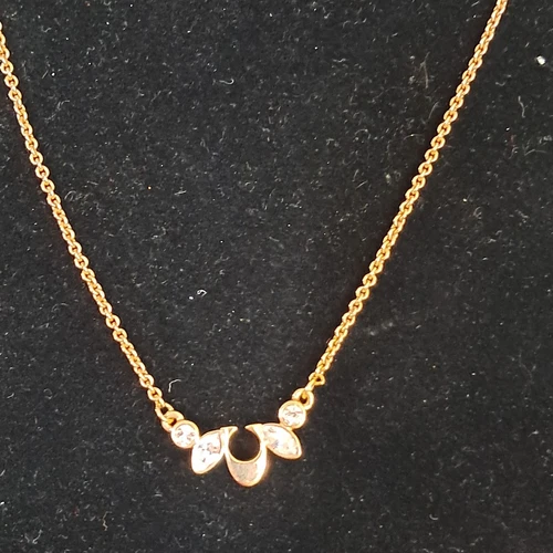 Collana Coach tono oro rosa