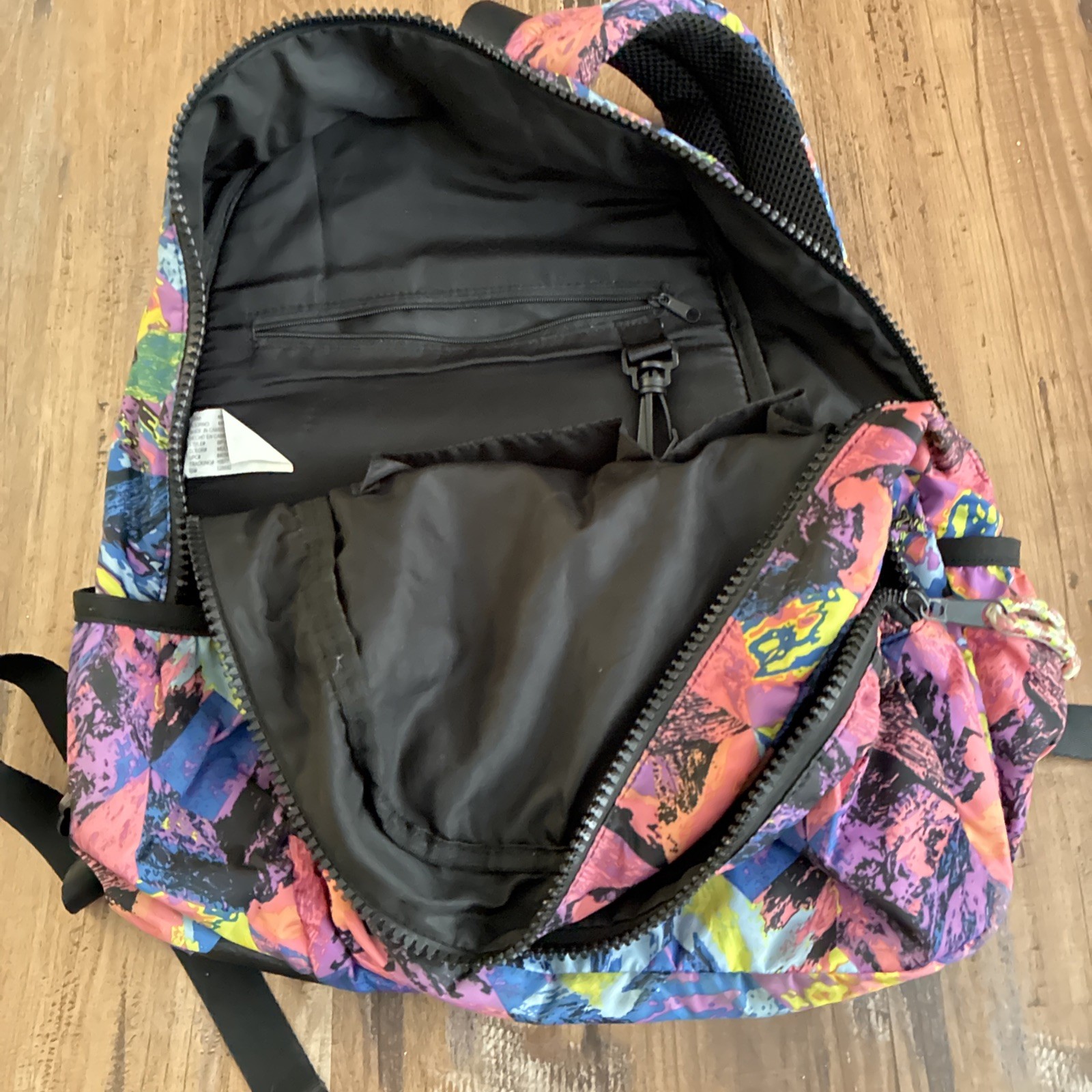 multi-colored backpack with a geometric pattern R… - image 4