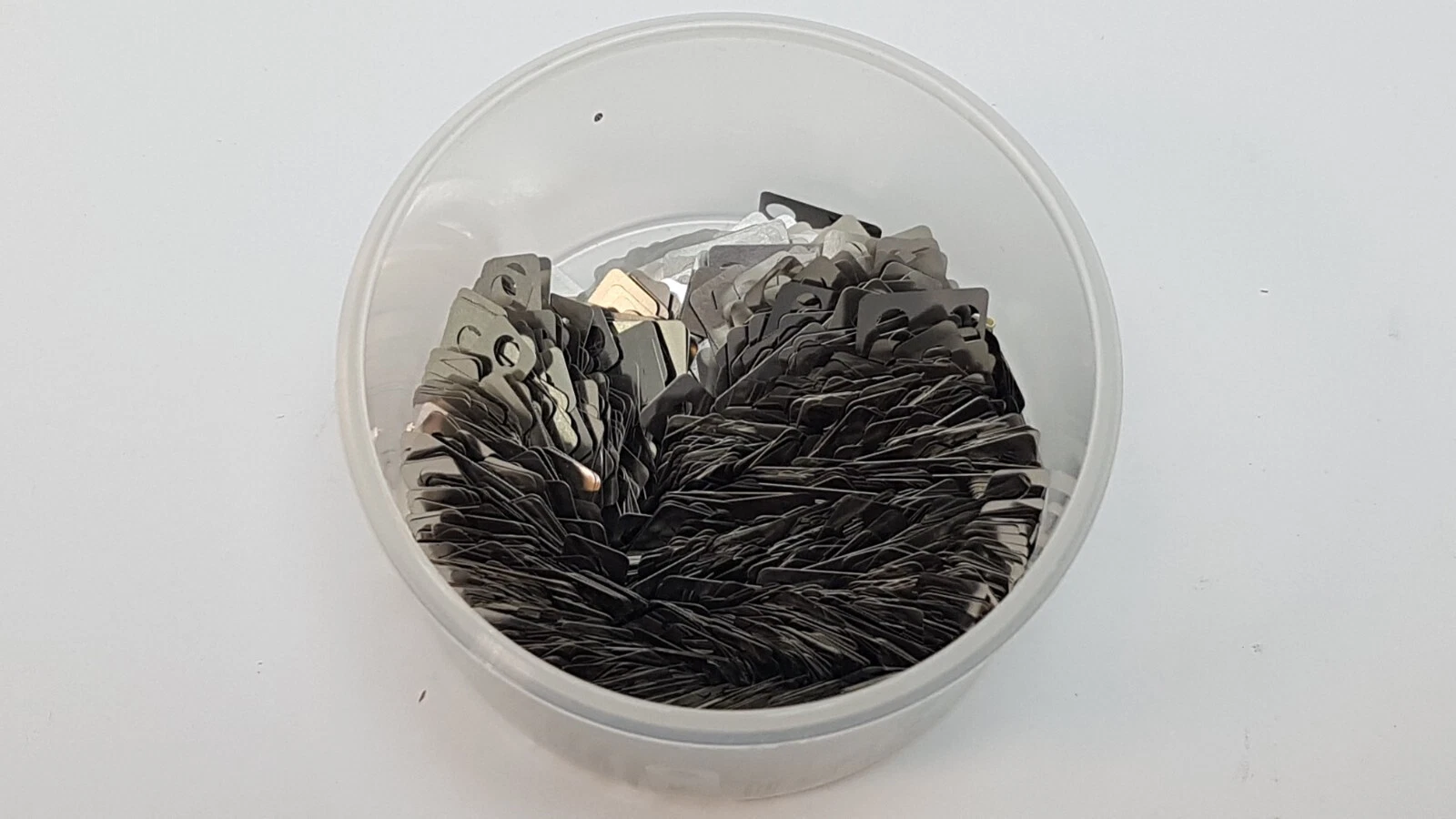 Open tub full of Lumenis MM-003793 slide surface plates