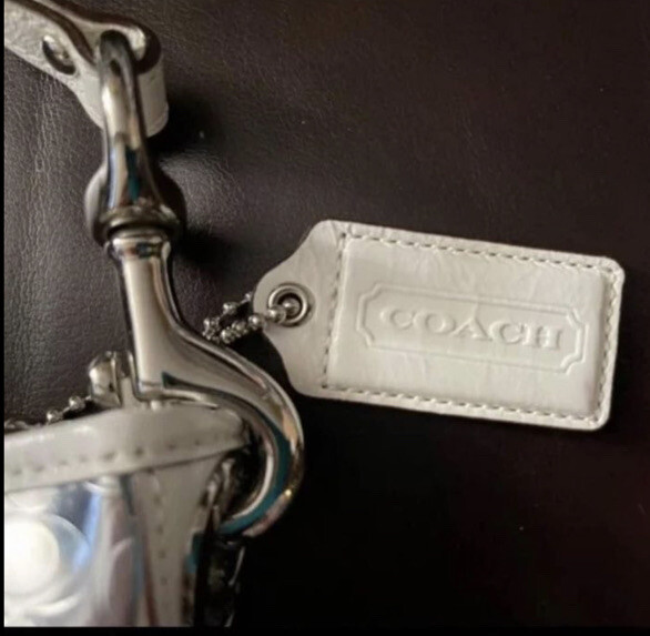 Small silver coach purse Clearance