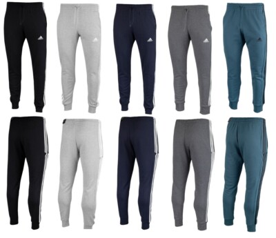 Nike Herren Hose Essentials French Terry Tapered Cuff 3-Stripes Sport Fitness
