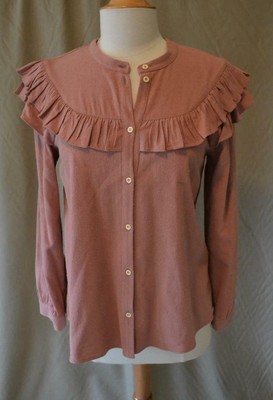 pink blouse with ruffles