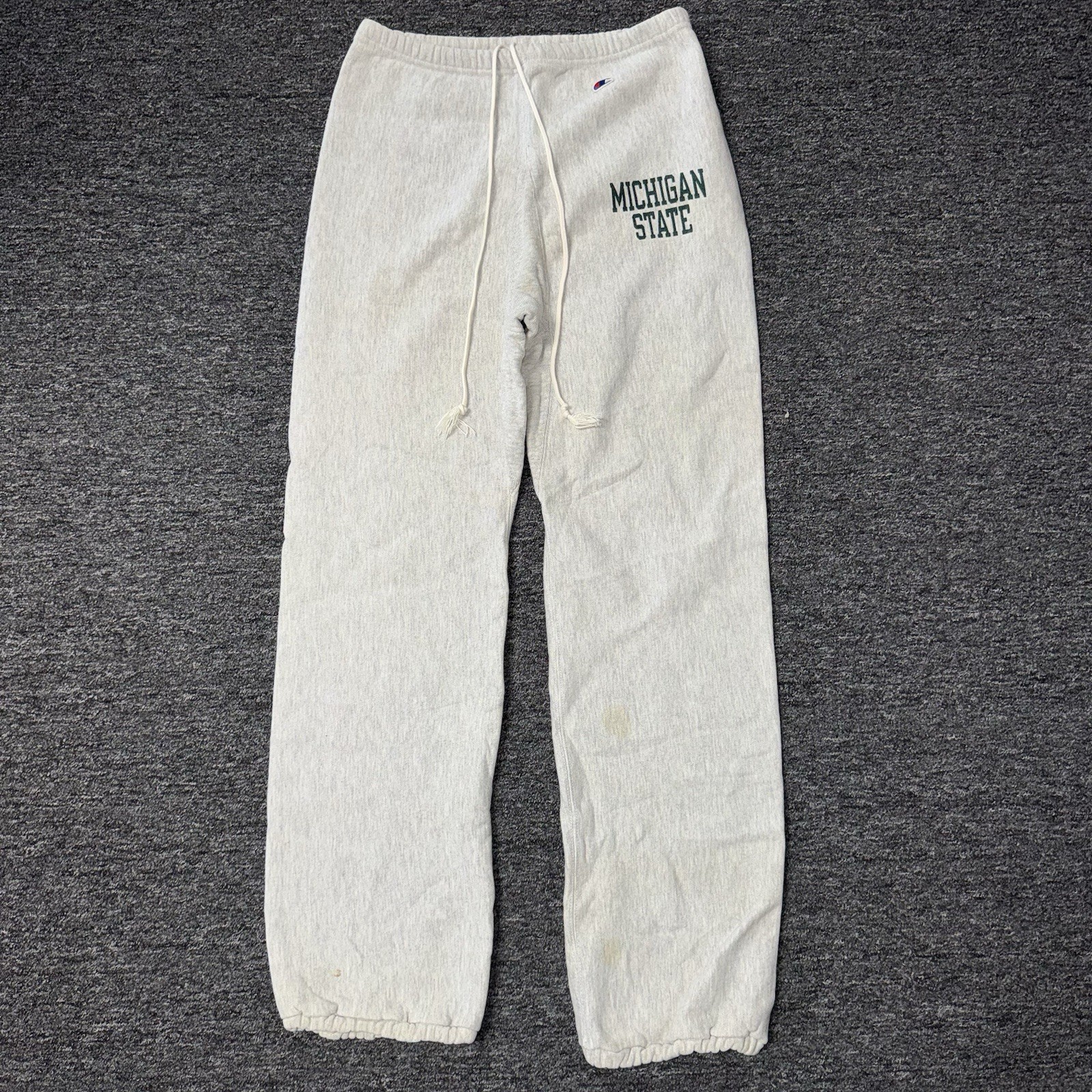 Pantalones deportivos vintage de los 80 Champion tejido inverso Michigan State grises para hombre - talla L