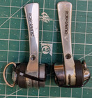 SHIMANO SL-7700 DURA- ACE 9 SPEED DOWNTUBE GEAR LEVERS.