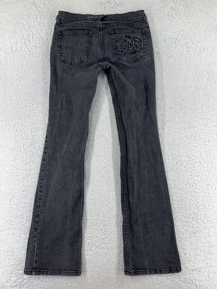 Pantalones de mezclilla Fabulosity para mujer 3 negros acampanados pedrería adornados Foto 2 de 4