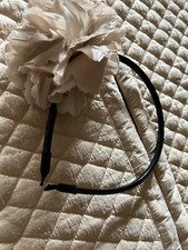 Beige large rose off center black headband fascinator soft layers