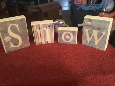 Decorative Blocks that Spell Out SNOW 
