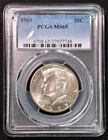 1965 KENNEDY HALF DOLLAR . PCGS CERTIFIED MS65. LIGHTLY TONED.