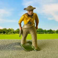 BRITAINS - LEAD COWBOY WITH PISTOL IN YELLOW SHIRT - VINTAGE FIGURE 243