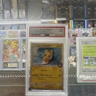 Pokemon Pikachu Japanese 329/Sm-p Playing In The Sea Promo Card PSA 9