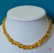 Véritable collier en ambre de baltique, rond difforme petite taille, certificat 