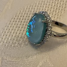 Silvery  Opal ￼ ring Size 6 Very Lovely Stone Half An Inch By Half An Inch ￼