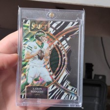 2023 Panini Select Premier Level Zebra Prizm Aaron Rodgers #121 Jets NFL